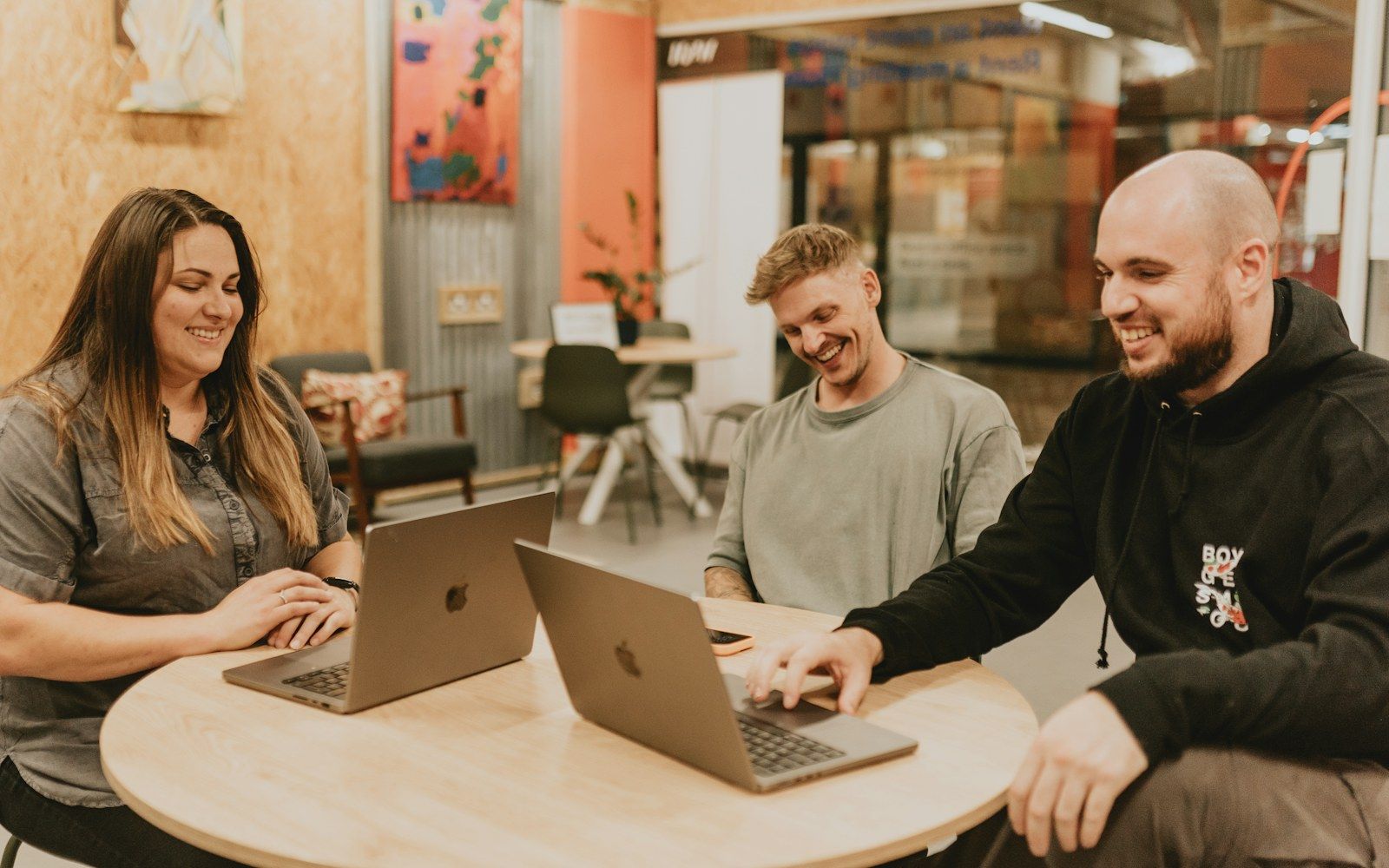 A young development team working on laptops